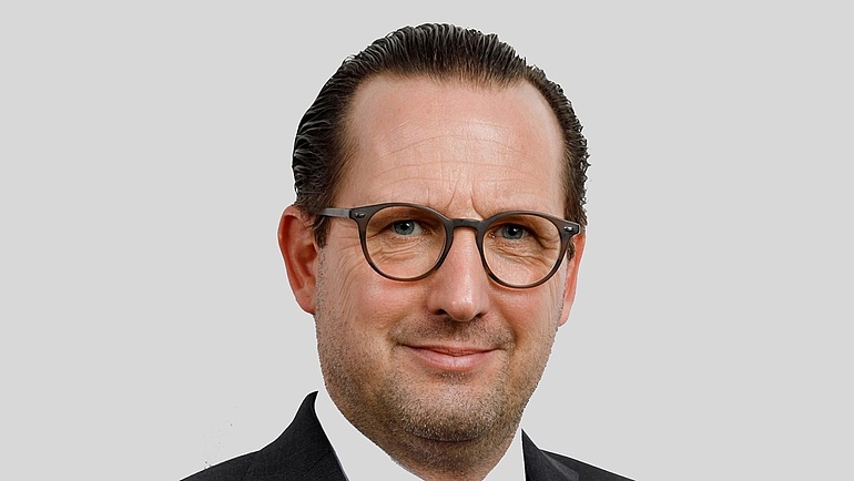Portraitfoto von Bundesinnungsmeister und Präsident des Bundesverbands Gerüstbau, Marcus Nachbauer.